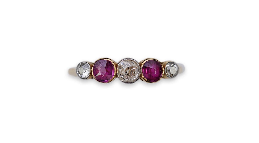 A ruby and diamond five-stone ring, early 20th century